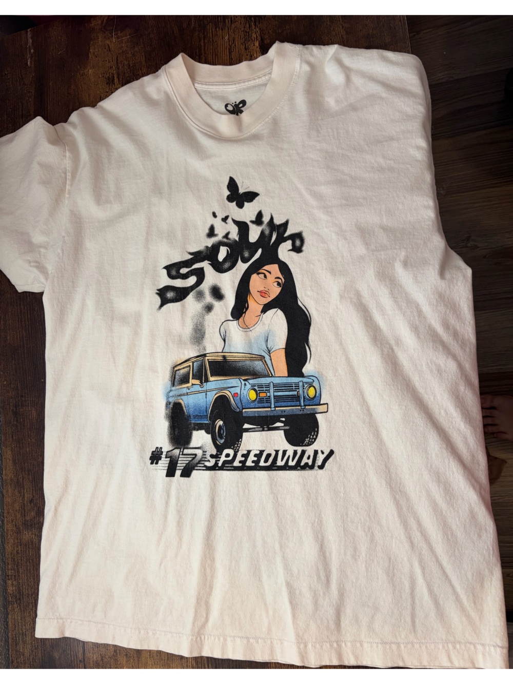 White Short Sleeve Graphic Tee with Blue Truck and Girl Artwork